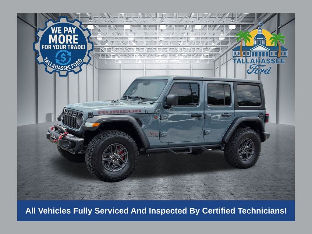 2024 Jeep Wrangler Rubicon in Anvil Clear Coat — front three-quarter view