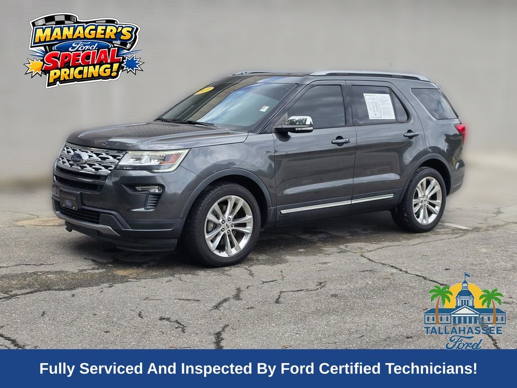 2019 Ford Explorer XLT in Magnetic Metallic — front three-quarter view