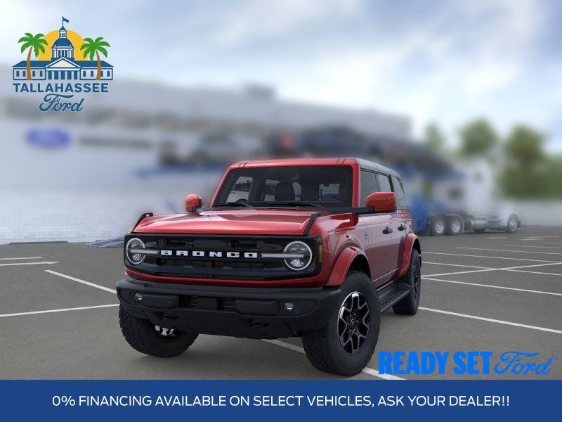 2026 Ford Bronco Outer Banks in Ruby Red Metallic Tinted Clearcoat — front three-quarter view