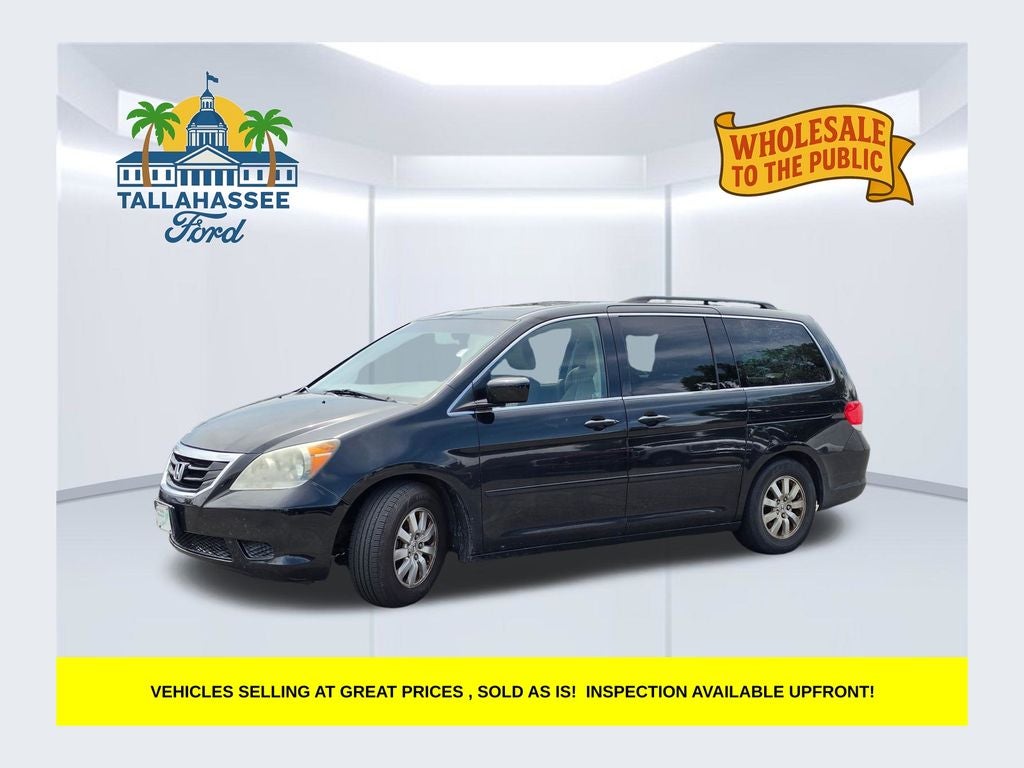 2009 Honda Odyssey EX-L in Nighthawk Black Pearl — front three-quarter view